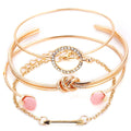 Rose gold chain and bangle bracelet set with rhinestone heart charm and pink accents