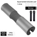 Gray barbell squat shoulder pad with foam center and adjustable strap
