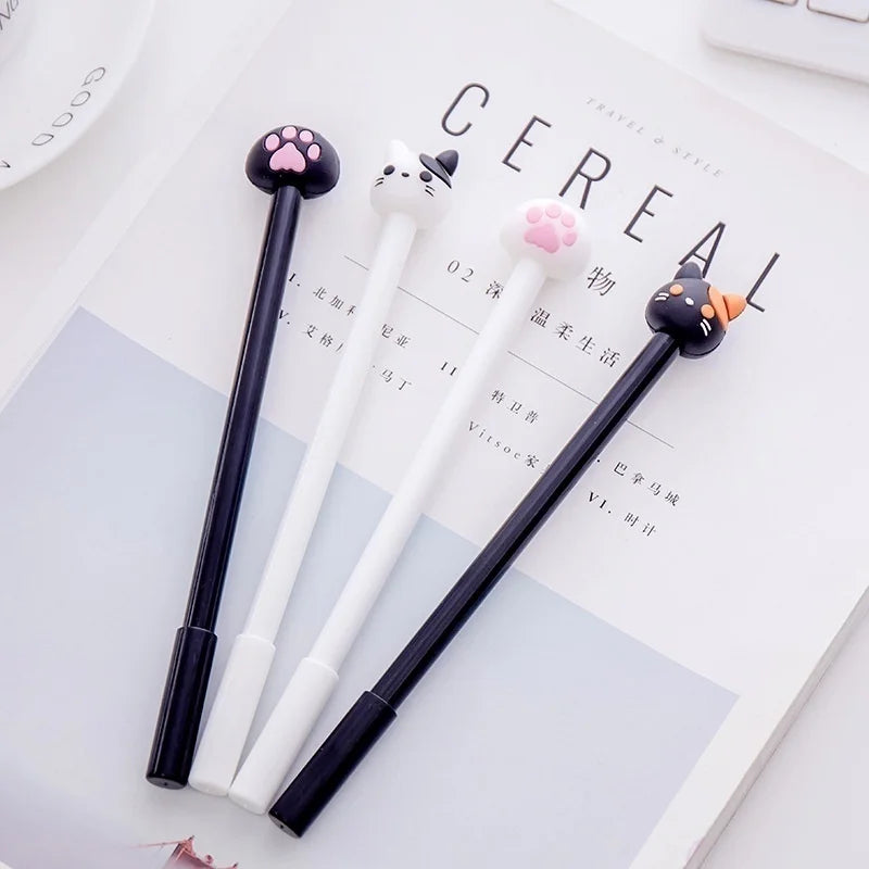 Kawaii cat gel pen set (10-pack) clipped on paper: black and white pens with paw caps