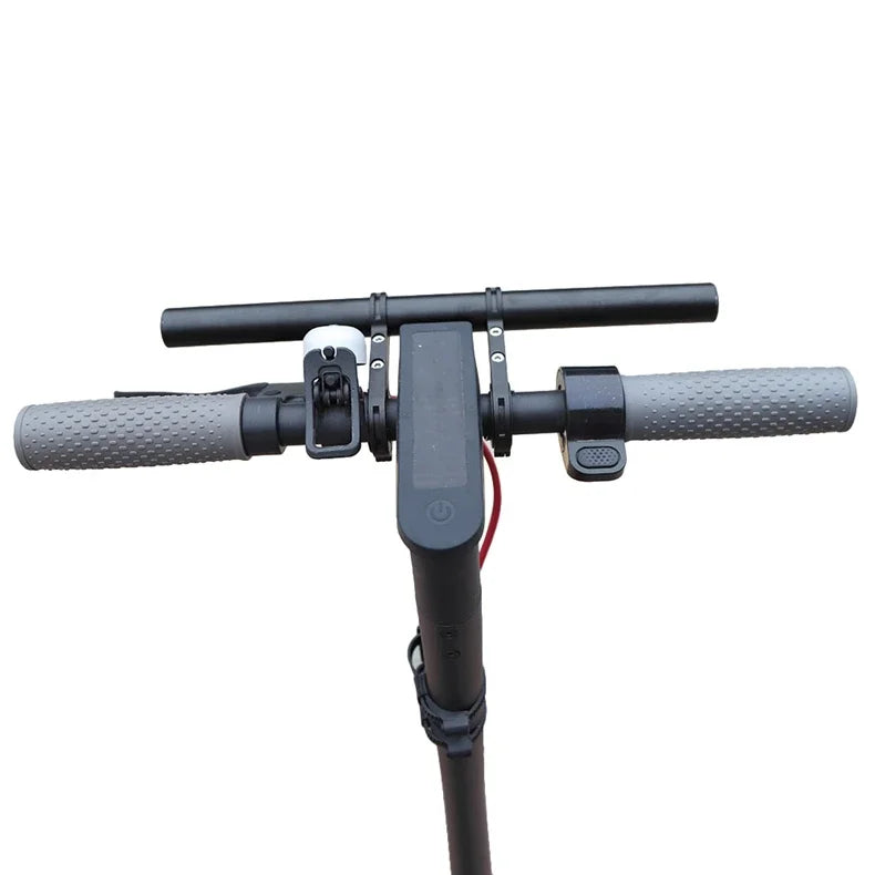 Bicycle handlebar extender mounted between grips with front light and control switch