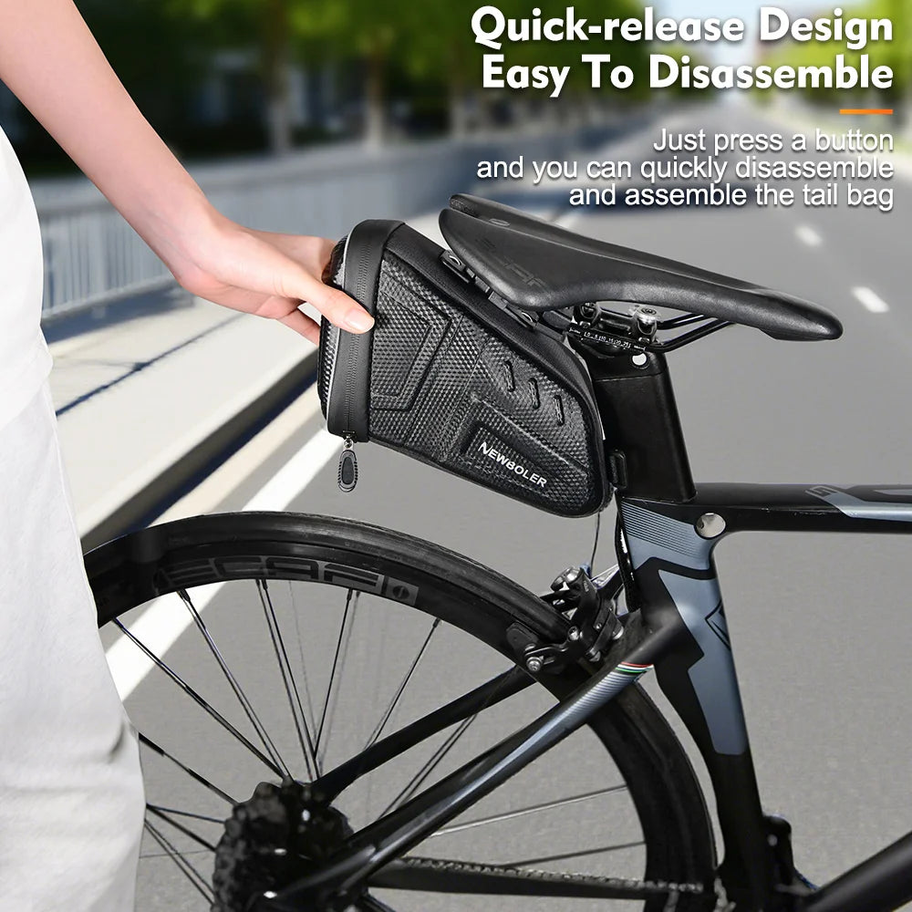 Black bicycle saddle bag on rear rack with zipper and quick-release design for removal