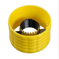 Yellow corn cob stripper peeler with serrated wheel blade, close-up on white background.